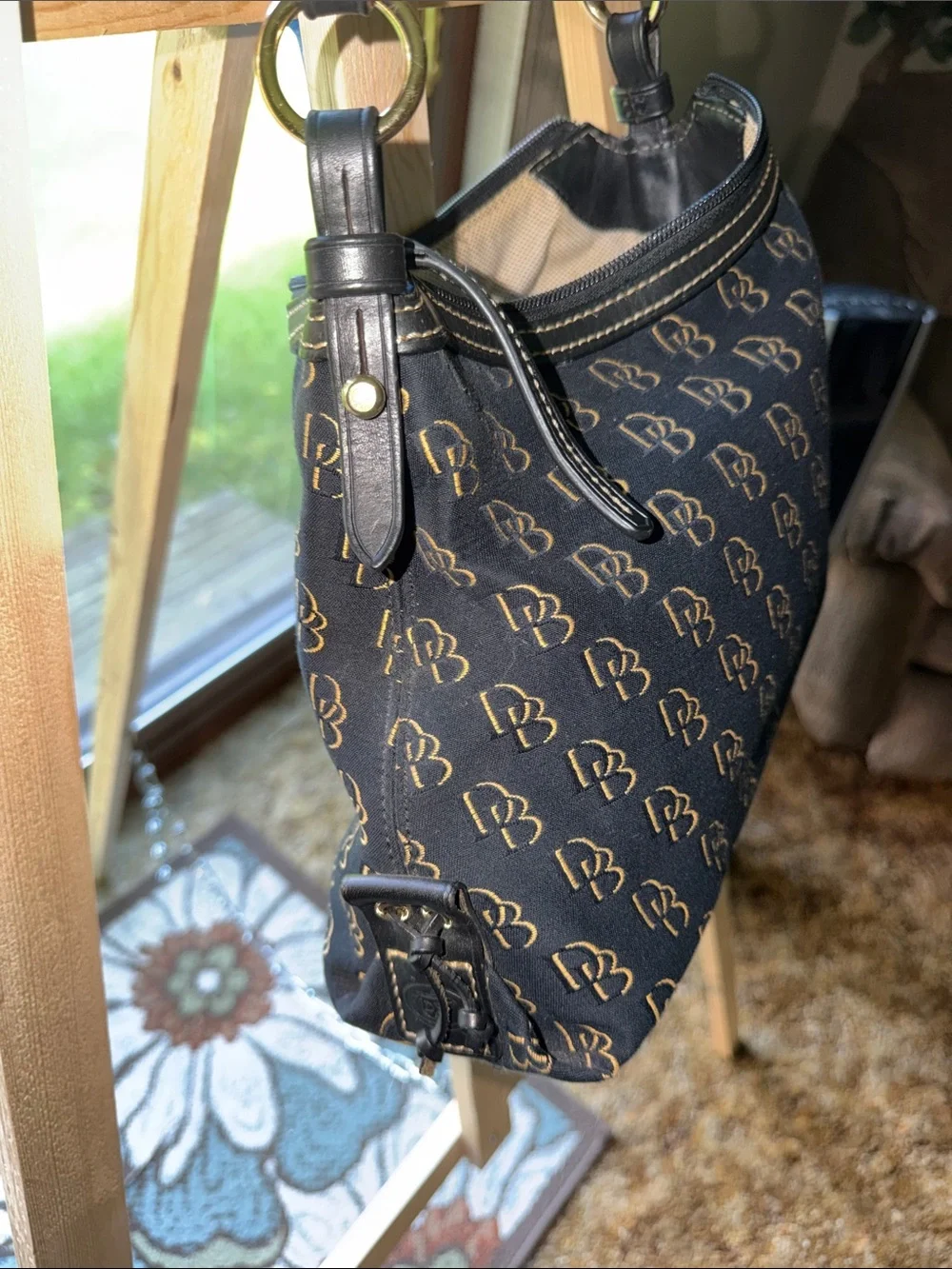 Dooney & Bourke Black with Gold Monogram Hobo Bag